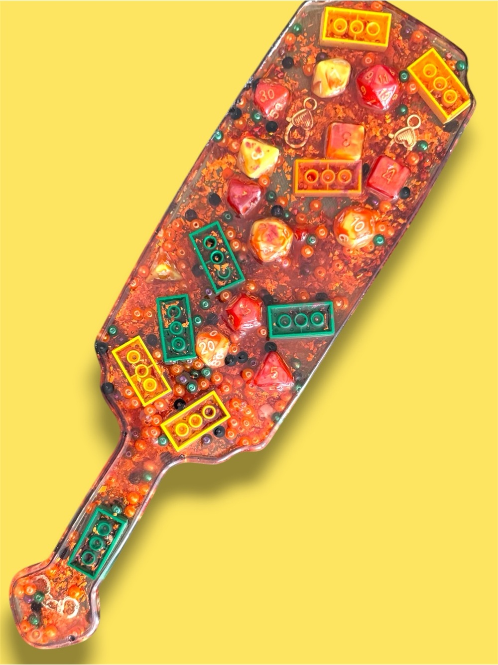 Hand Crafted Orange Resin Paddle with Polyhedral Dice and Legos